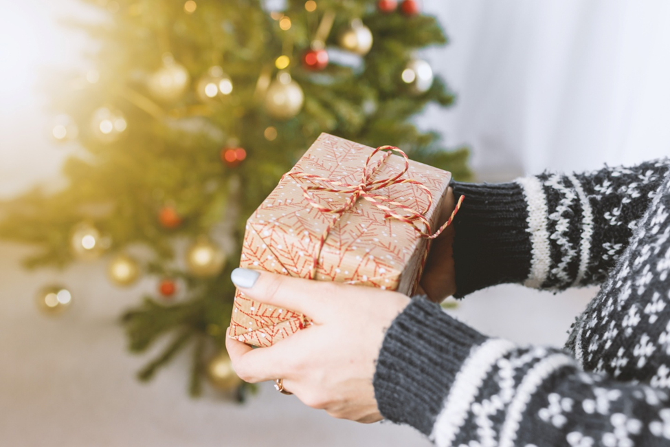 https://www.staffingattiffanies.com/wp-content/uploads/2019/12/womans-hands-hold-christmas-gift-box.png