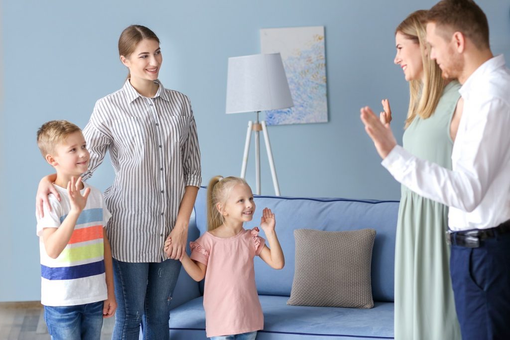 Parents leaving their children with nanny at home