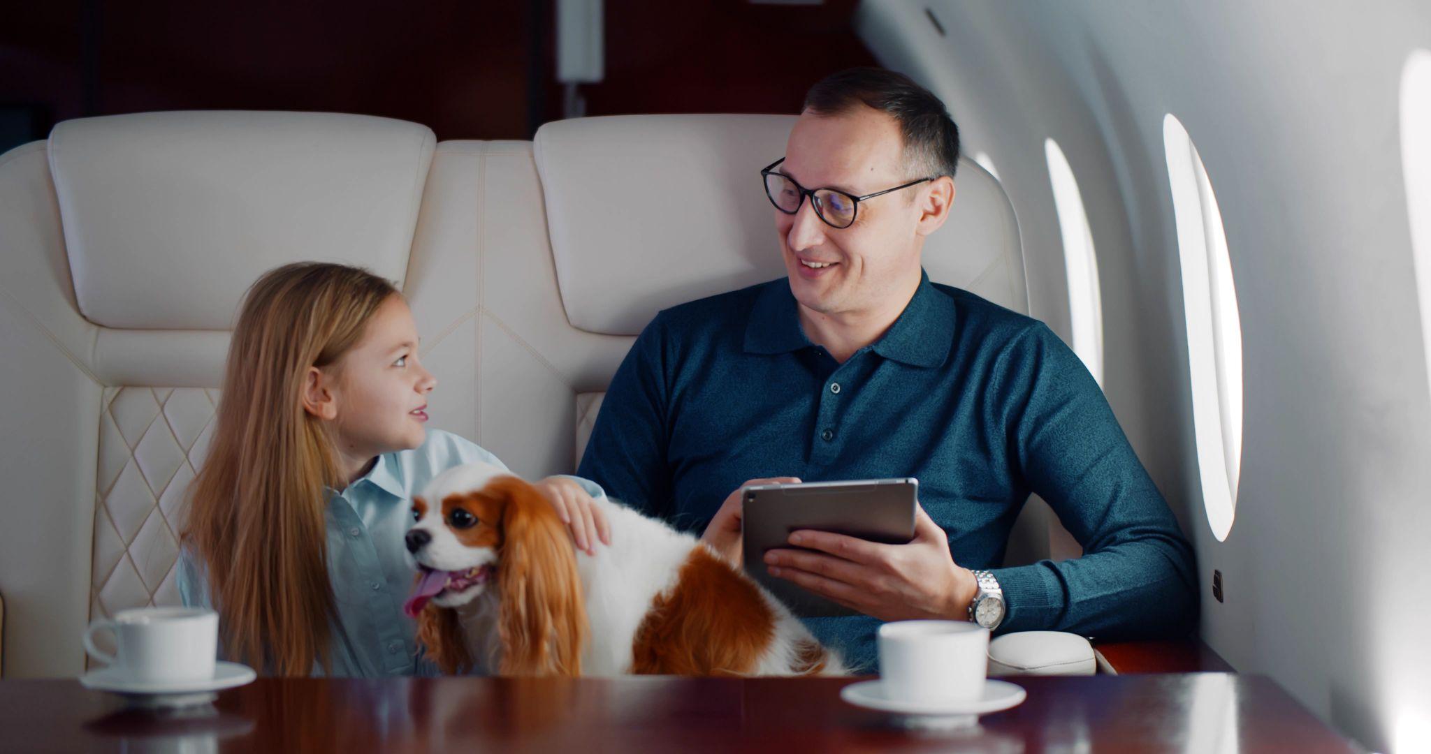 High net worth family on a private jet