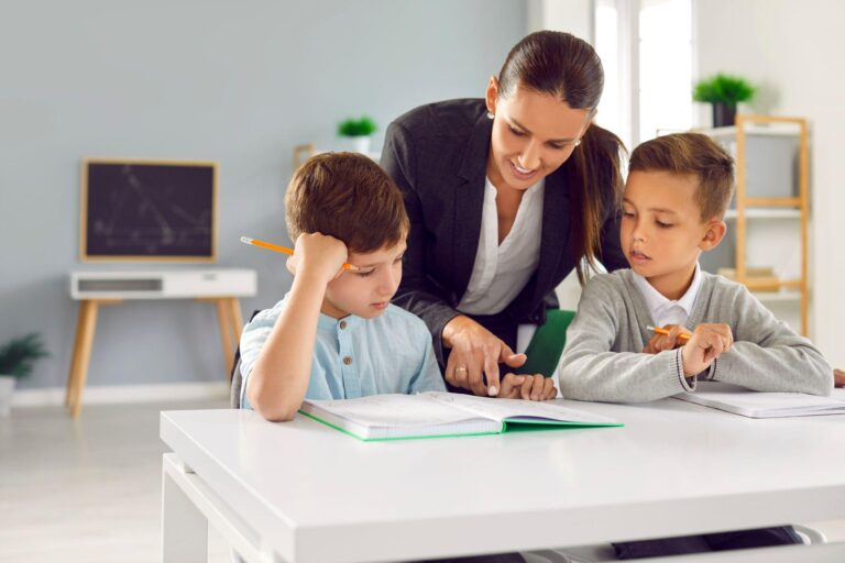 ROTA nanny helpinng 2 boys with their homework
